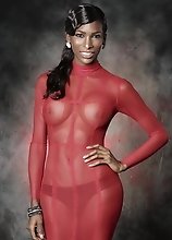 Black Natassia posing in red dress